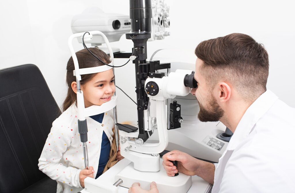 A child having an eye exam to monitor the progression of myopia.